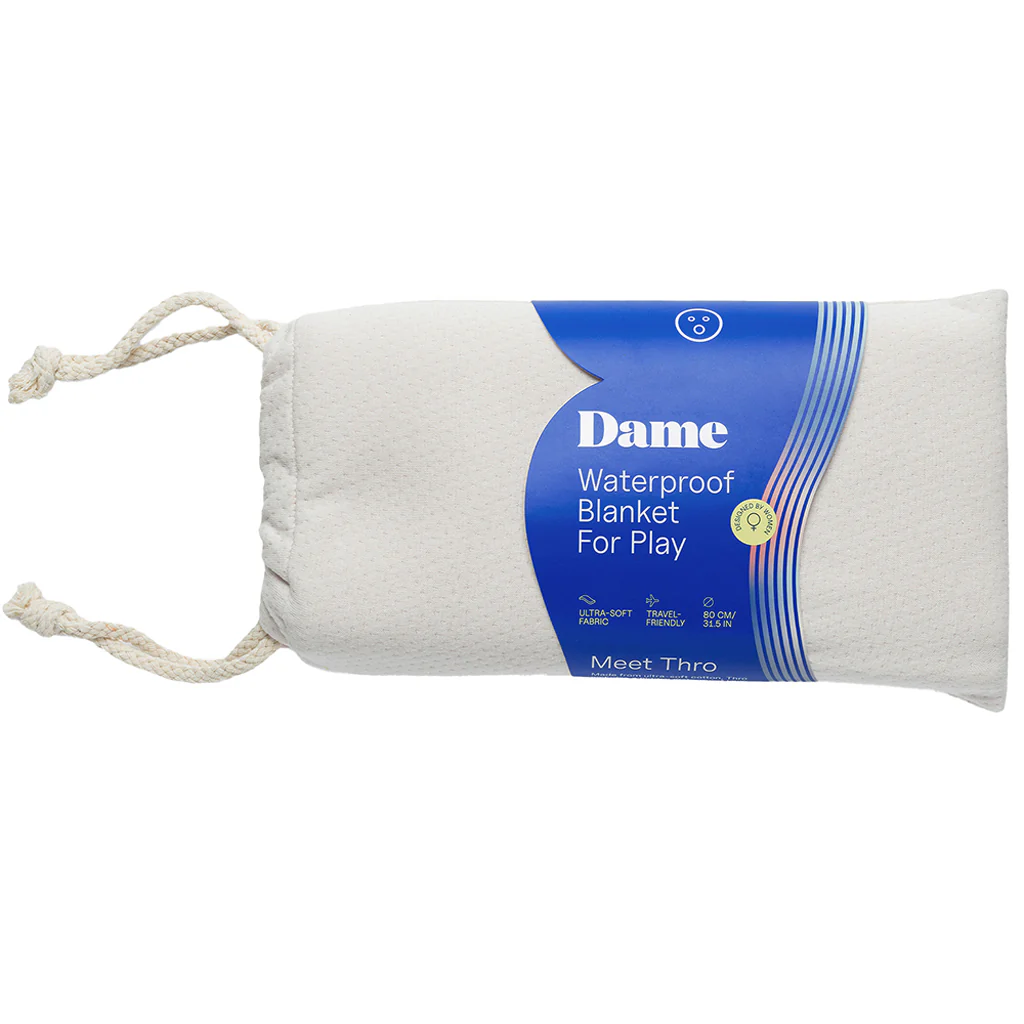 1398-dame-thro-travel-waterproof-blanket-in-oat-1.webp